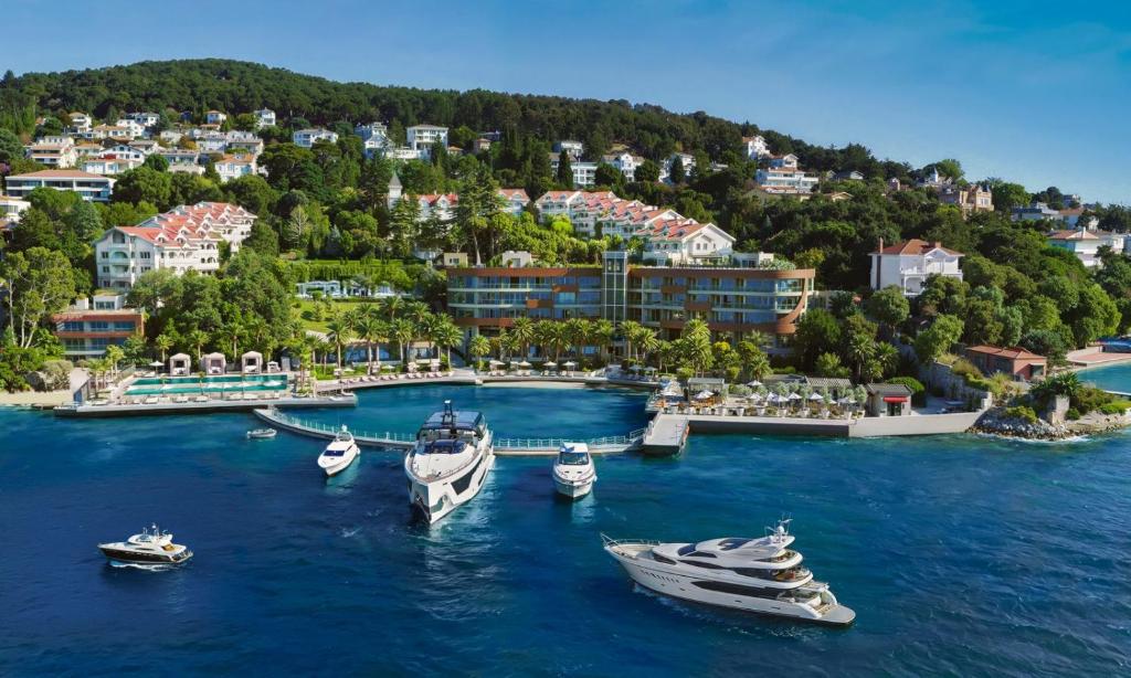 a group of boats are docked in a harbor at Princes' Palace Resort, Buyukada - Member of The Leading Hotels of the World in Adalar