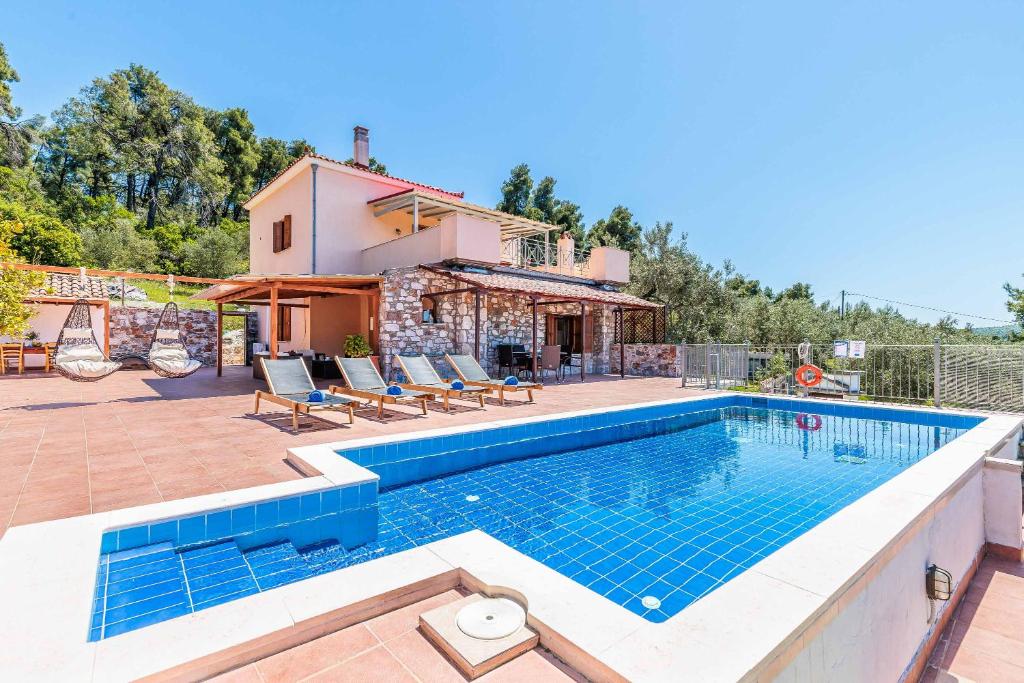 an image of a villa with a swimming pool at Villa Terracotta in Alikias