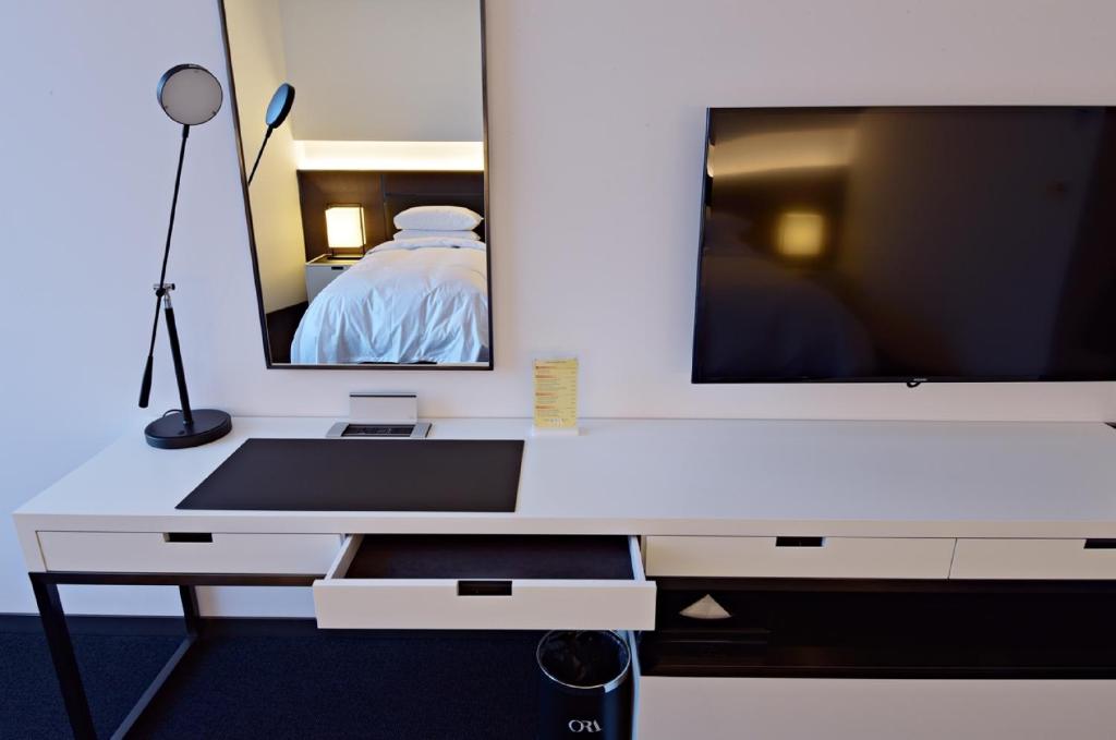 Postel nebo postele na pokoji v ubytování Hotel Ora Incheon
