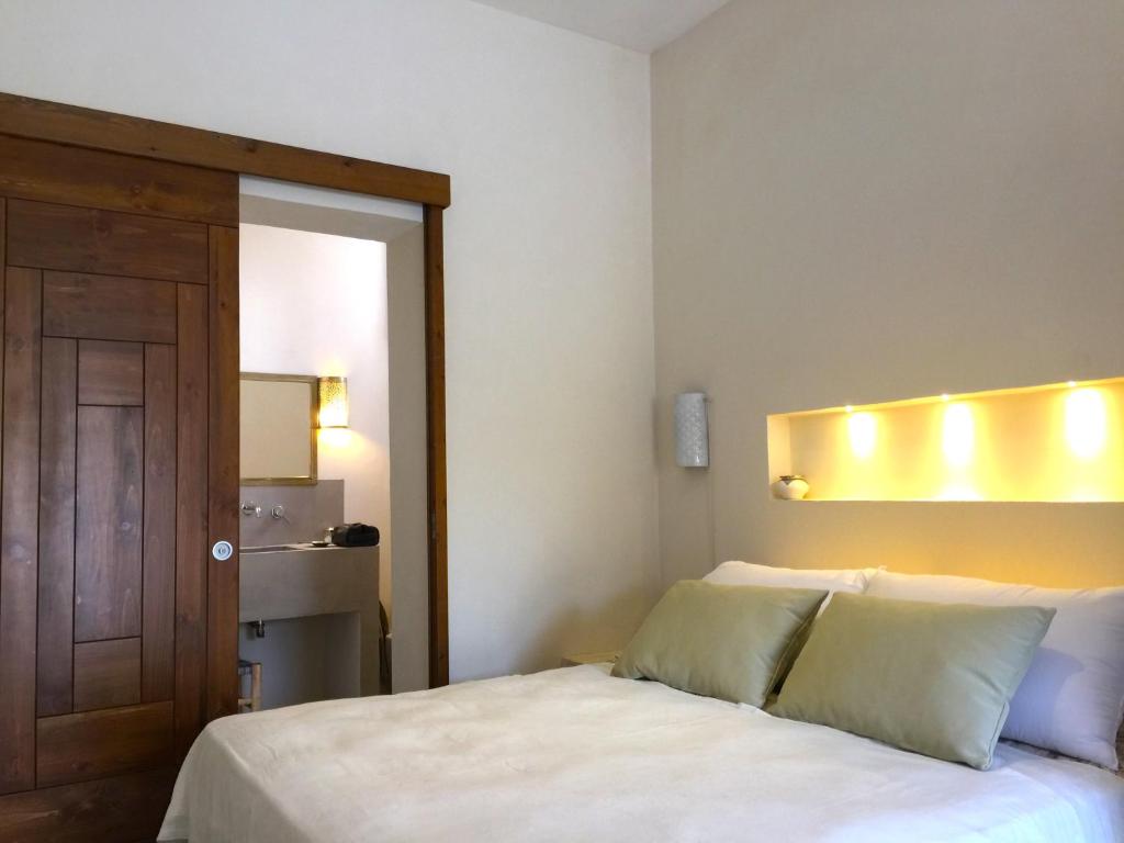 Postel nebo postele na pokoji v ubytování Casa Sultana