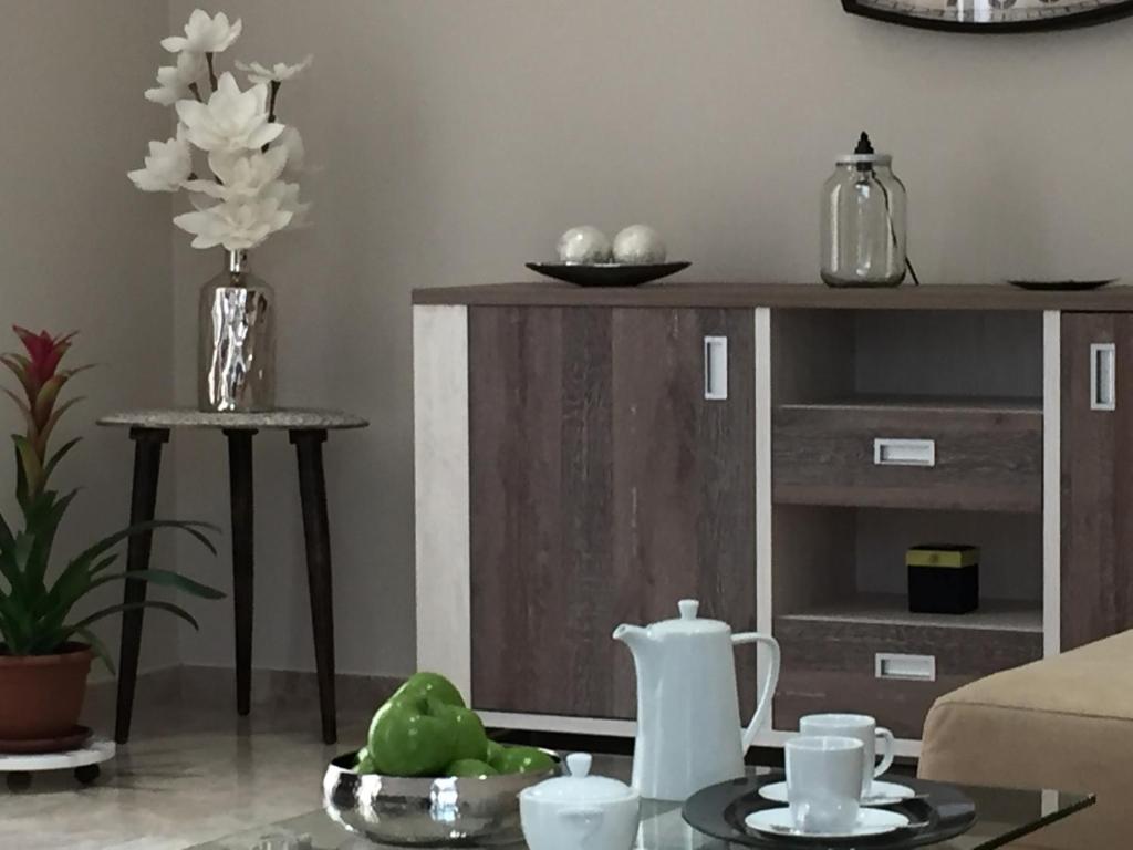 Příslušenství pro přípravu čaje a kávy v ubytování Apartamento San Pedro