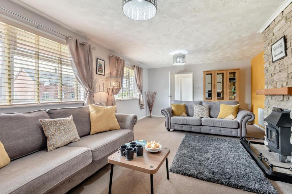 a living room with a couch and a fireplace at 2 Bed in Wool oc-r29949 in Wool