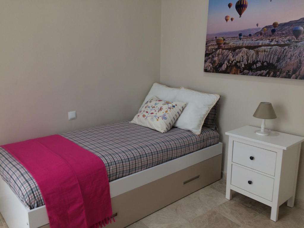 Postel nebo postele na pokoji v ubytování Apartamento San Pedro