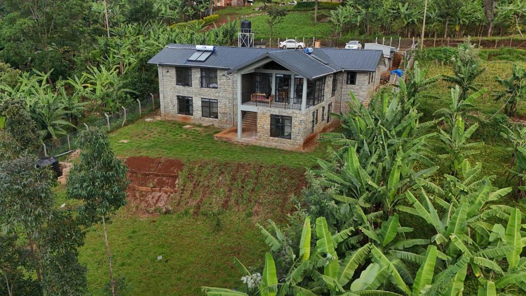 an aerial view of a house in the jungle at Kapto Camp in Kapchorwa