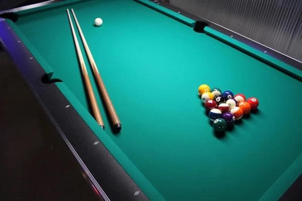 a heart of billiard balls on a pool table at J Walker Hostel in Weligama