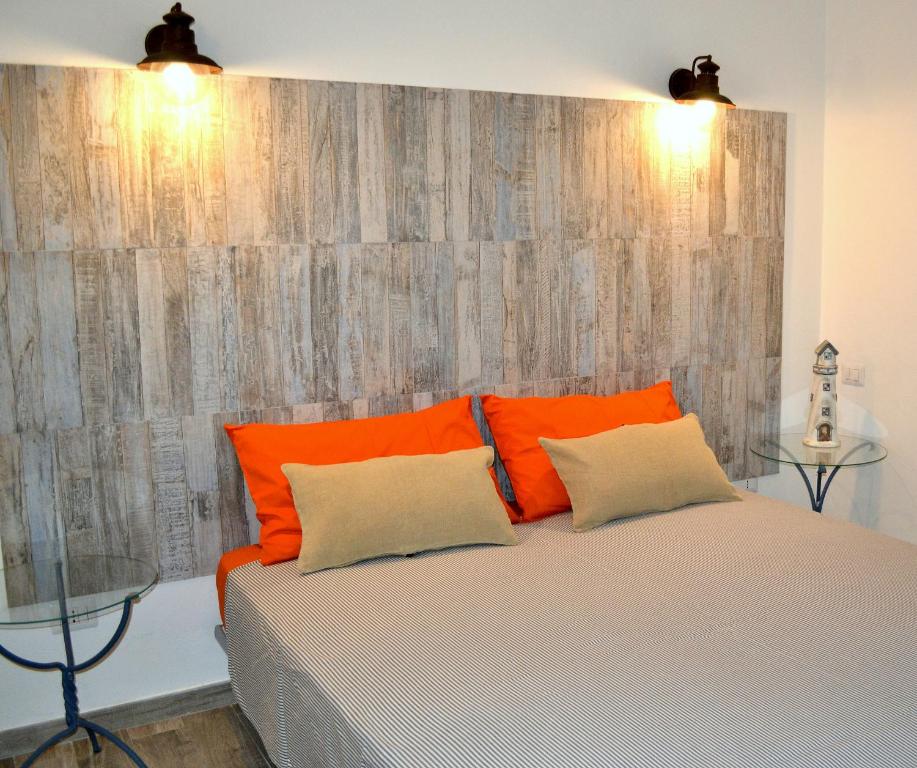 Een bed of bedden in een kamer bij B&B La Casa Bianca di Porto Conte
