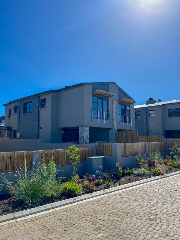 a house on the side of a road at 12 Langdown Ridge in Plettenberg Bay
