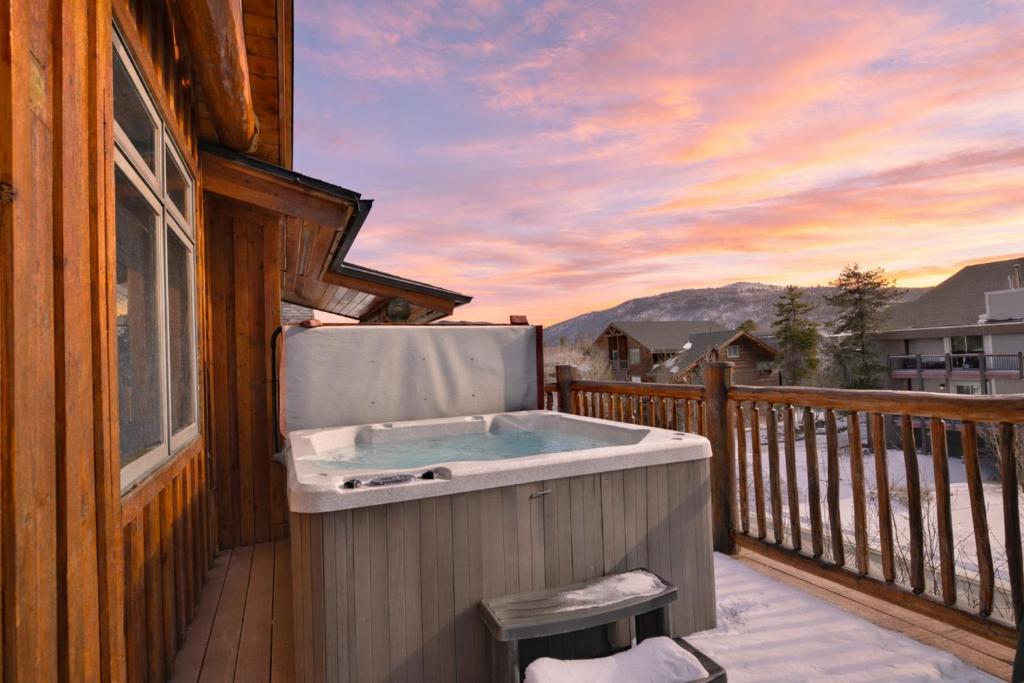 a hot tub on the balcony of a house at Mt. Victoria Lodge Penthouse Condo: Downtown, Hot Tub in Frisco