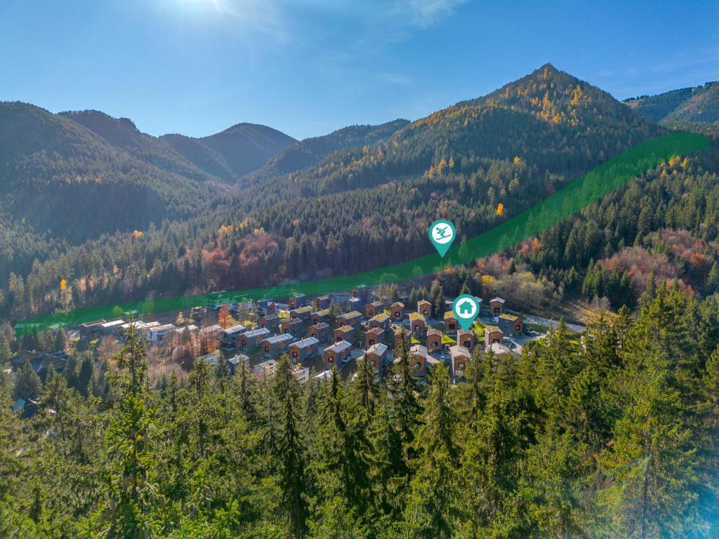 an aerial view of a village in the mountains at Fox Hrabovo Apartment, Malino Brdo, Bike & Ski in Ružomberok