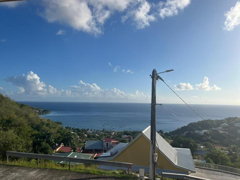 a view of the ocean from a hill at Milles Eclats in Les Anses-dʼArlets