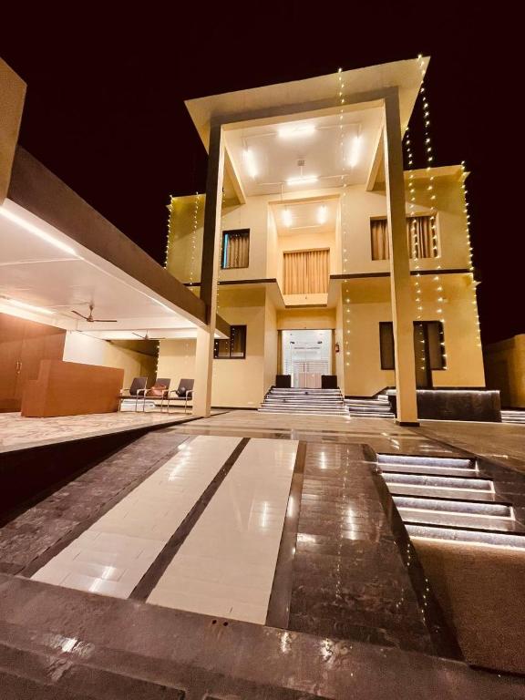a view of a building at night at Shree Shivay Homestay in Sathri
