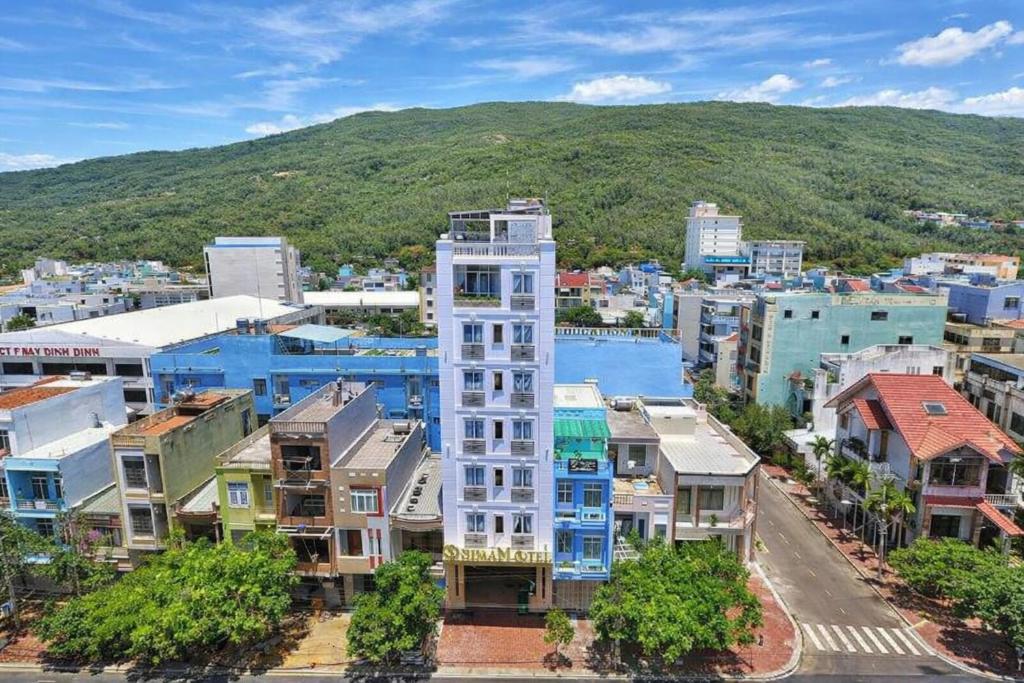 an aerial view of a city with buildings at Selima Hotel in Quy Nhon