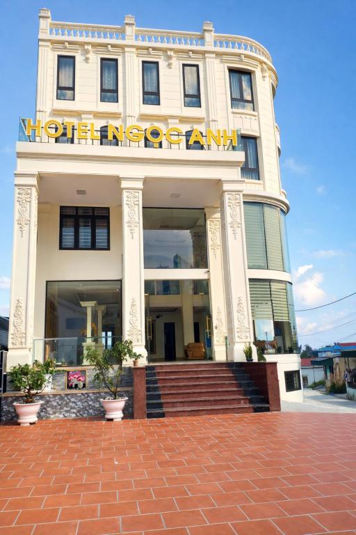 a building with a sign on the front of it at Hotel Ngoc Anh - Van Don in Quang Ninh