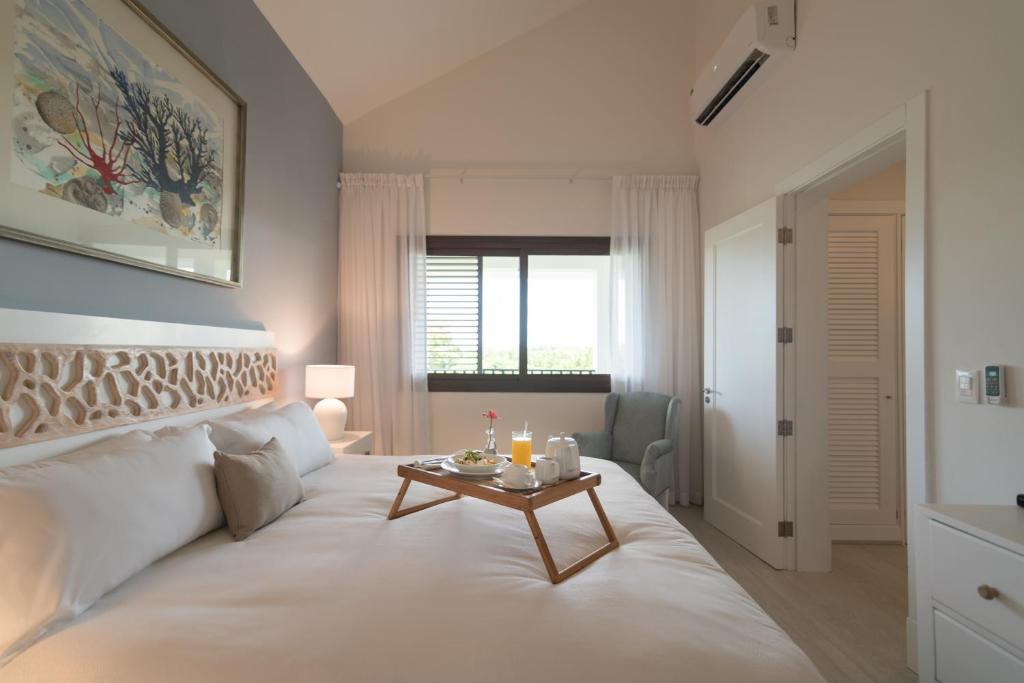 Postel nebo postele na pokoji v ubytování Hotel Casa Hemingway