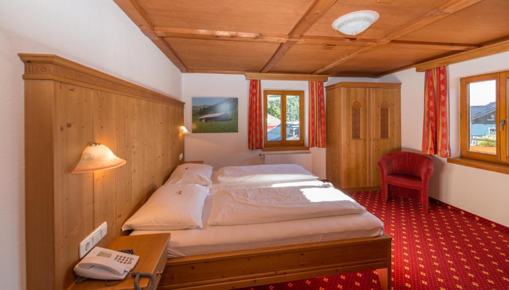 Postel nebo postele na pokoji v ubytování Hotel Bechlwirt