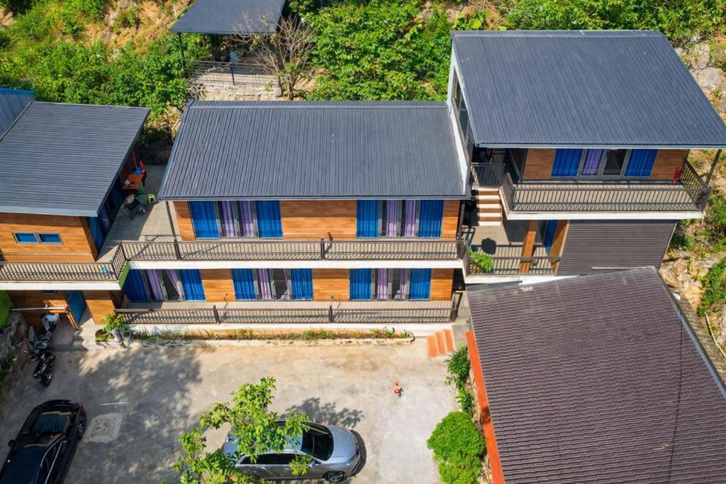 an overhead view of a house with blue windows at BG Stone Homestay in Mộc Châu