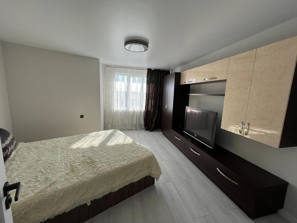 Postel nebo postele na pokoji v ubytování Nice apartment