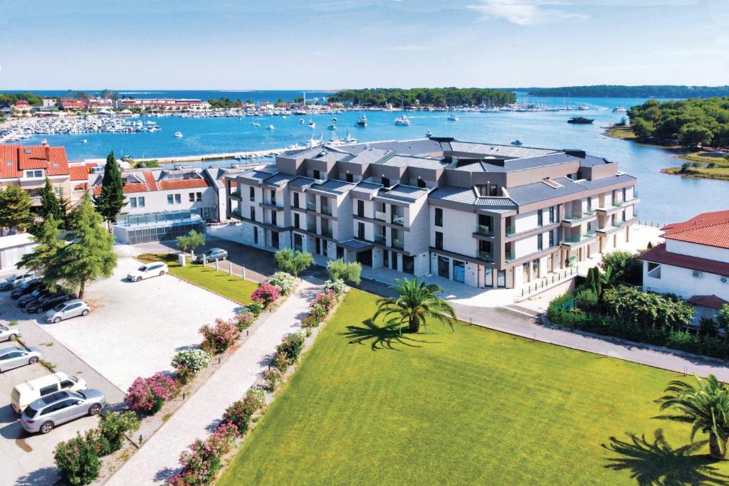 an aerial view of a large building with a park at Visula Hotel & Spa - New Opening 2026 in Medulin