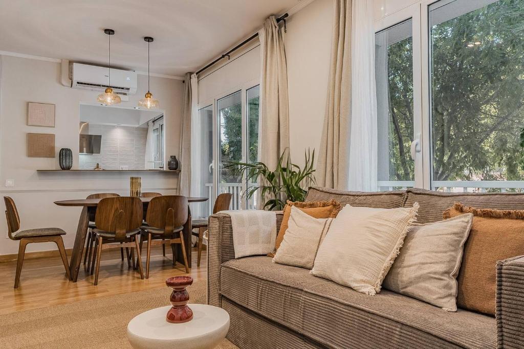 a living room with a couch and a table at NEW Refurbished Modern Apartment in Barcelona