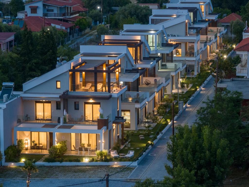 an aerial view of a large white building at Argilos & Argilos Deluxe Residential Complexes in Ofrínion