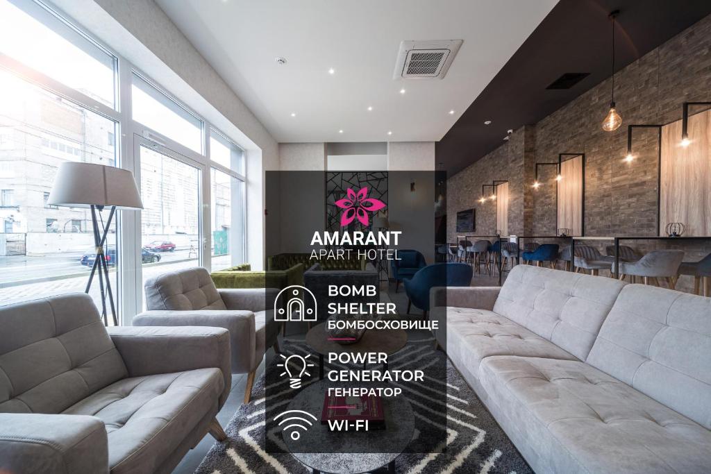 a lobby with couches and a sign that reads amazon expert plant fuel powered at Amarant Apart Hotel by CHM in Kyiv