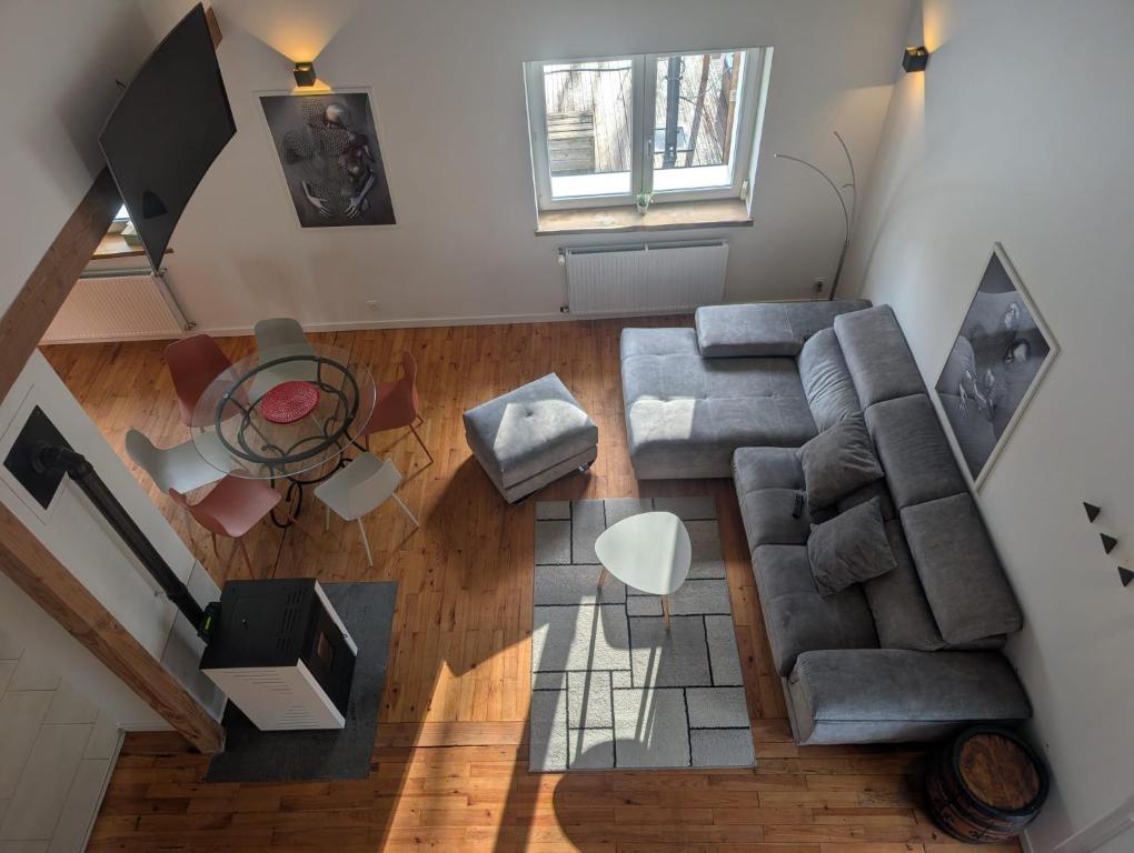 an overhead view of a living room with a couch at Gîte de La Forge in Hesse