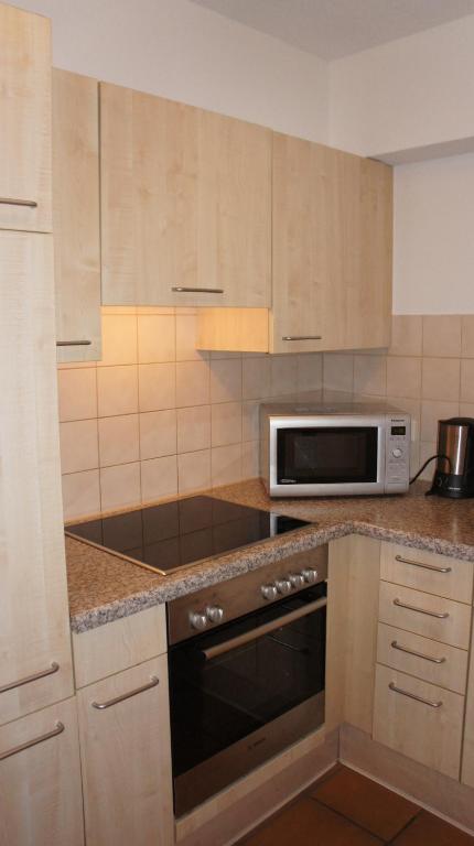 Kuchyň nebo kuchyňský kout v ubytování Ferienhaus Rheintalblick