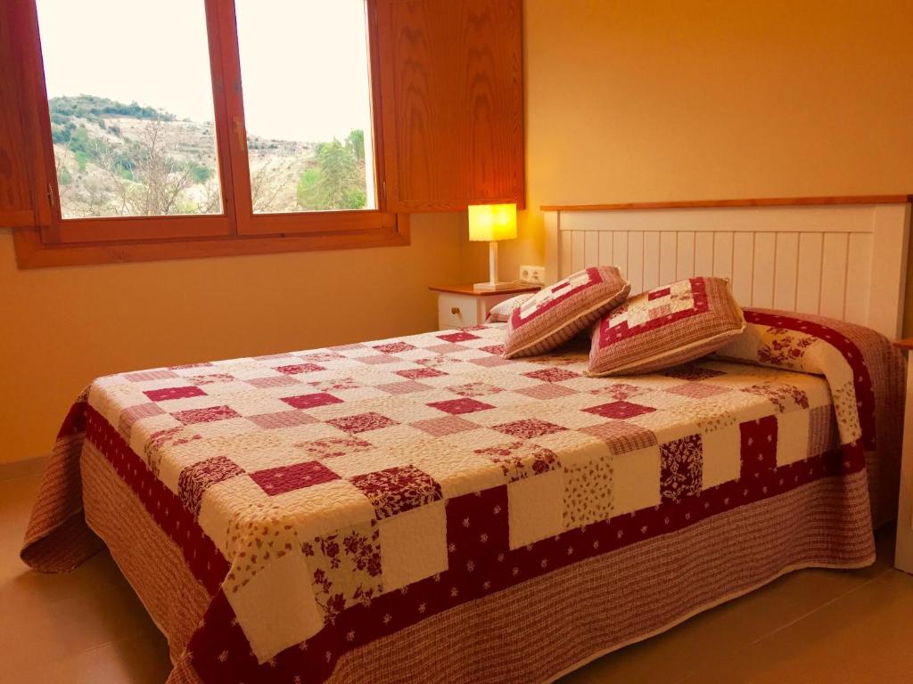 Postel nebo postele na pokoji v ubytování Apartament Escaladei