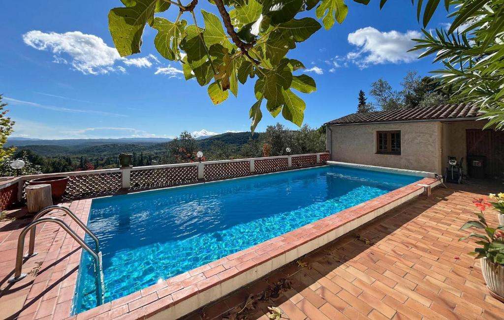 a swimming pool on top of a house at La Nature in Seillans