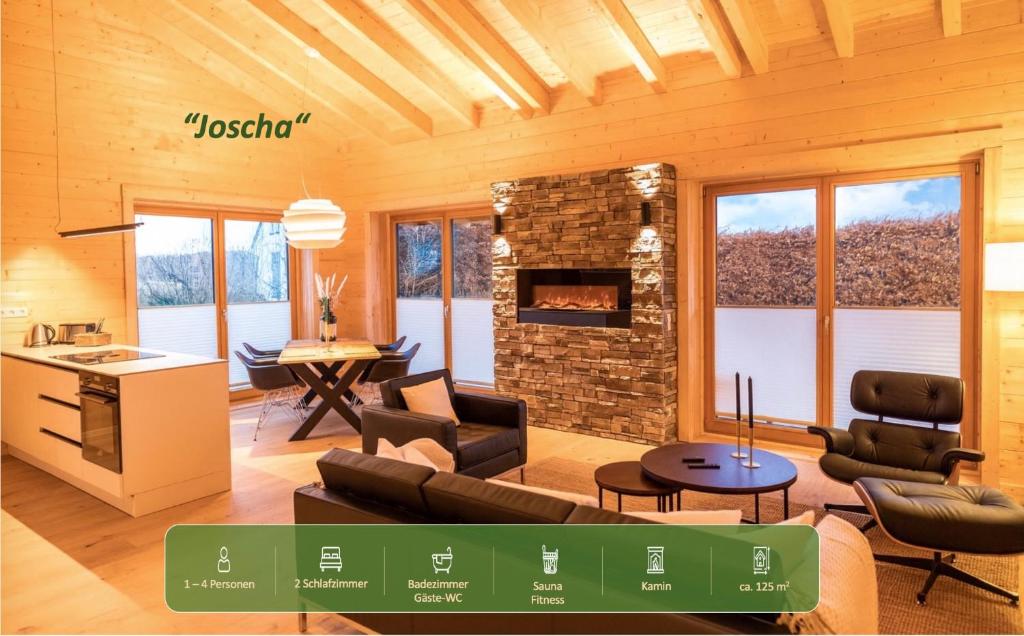 a living room with a couch and a fireplace at NETTEN Naturerlebnis Holz-Chalets in Daun