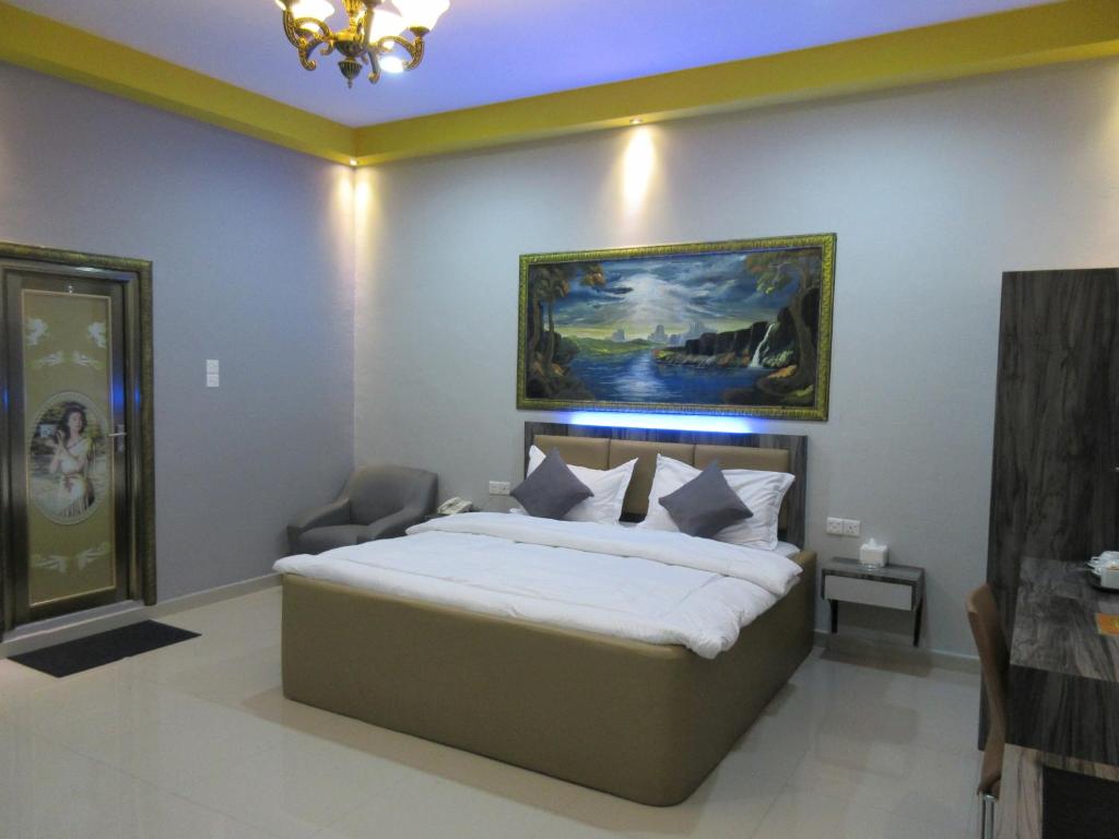 Postel nebo postele na pokoji v ubytování Hotel 01 Batam