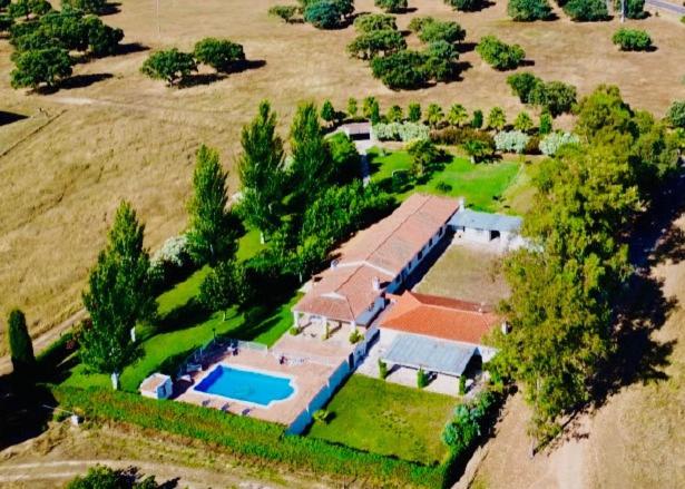 an aerial view of a large house with a swimming pool at Dehesa La Parrilla - VUT- Eventos in Pepino