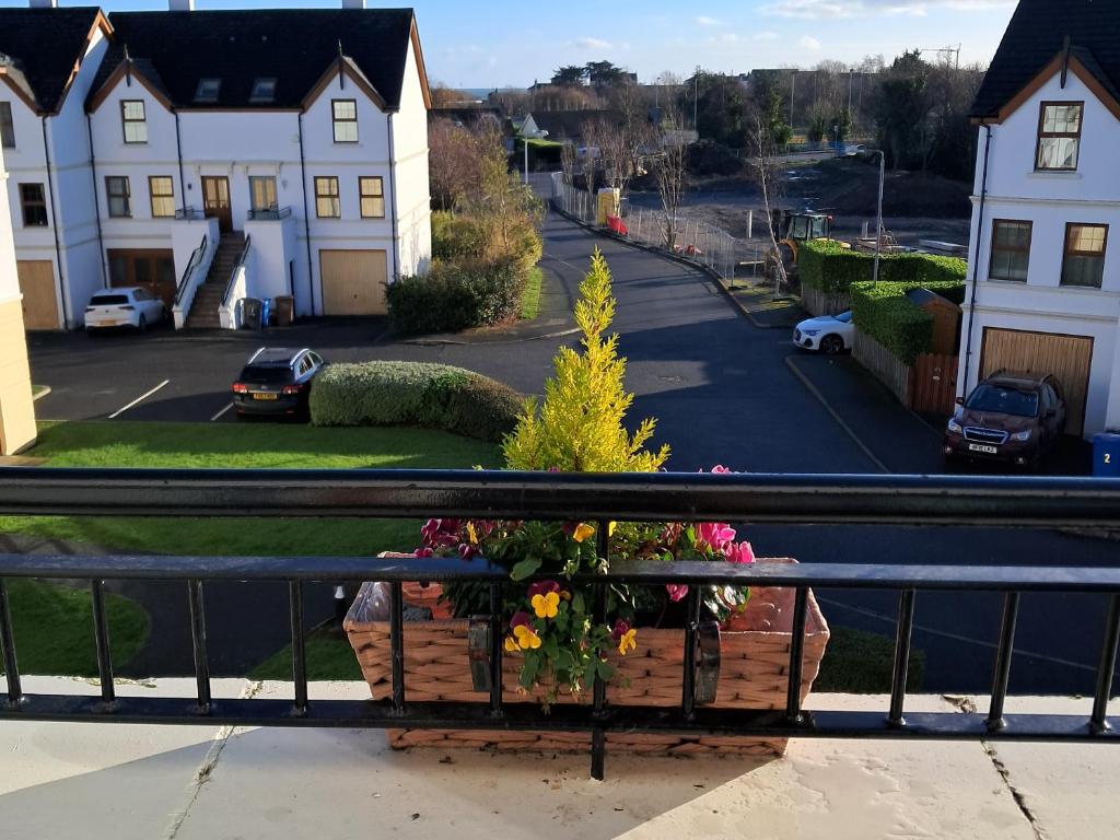 a balcony with a flower box on a railing at The Brooks in Newcastle