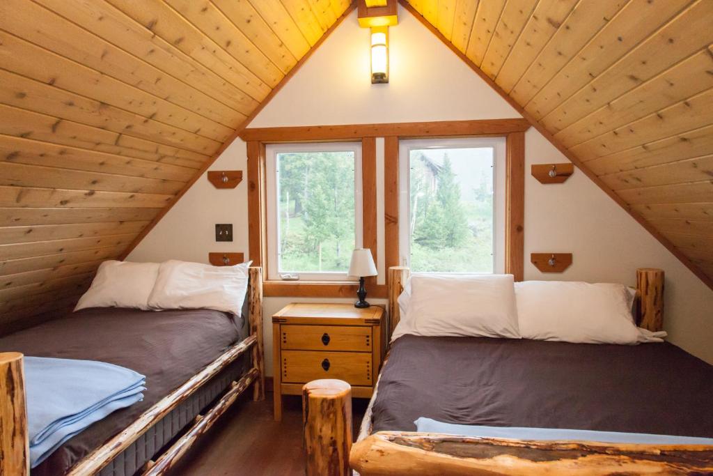 Voodi või voodid majutusasutuse Homestake Lodge toas