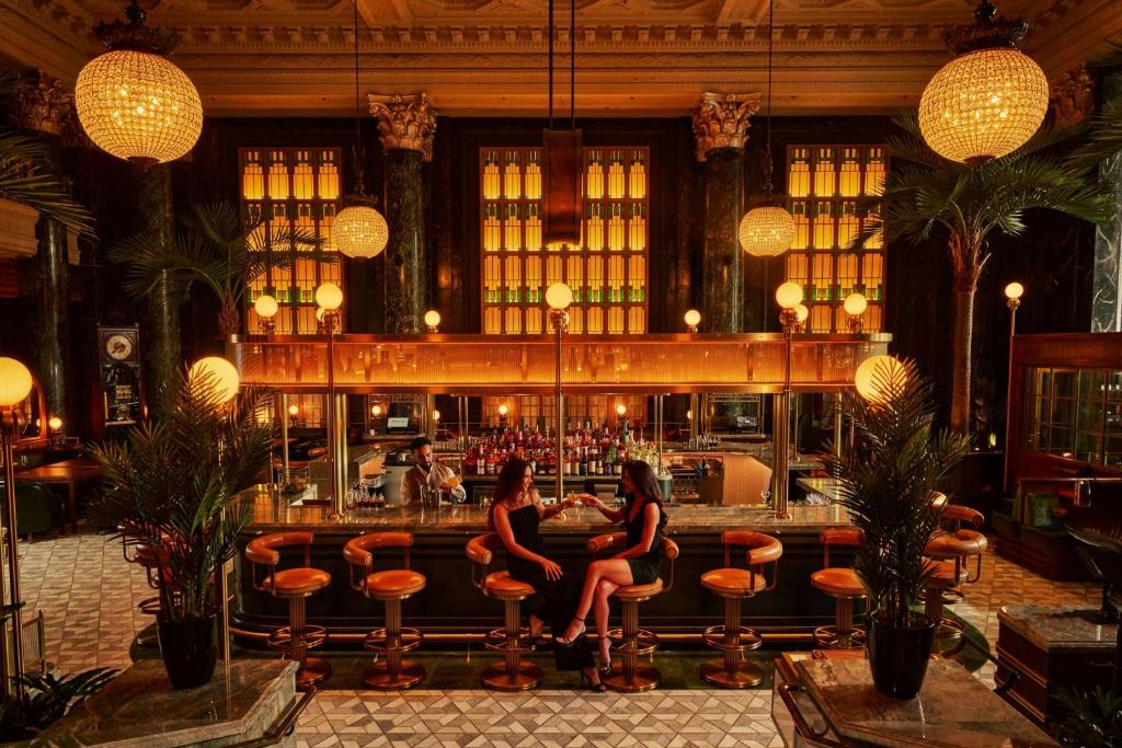 two women sitting at a bar in a restaurant at The Westin St. Francis San Francisco on Union Square in San Francisco