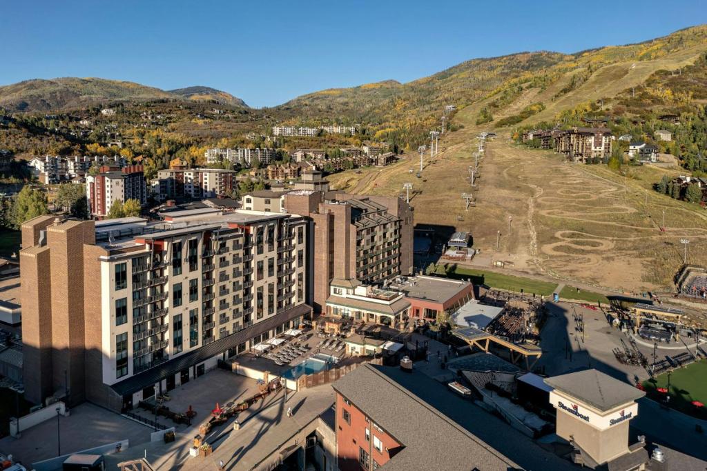 an aerial view of a city with mountains in the background at Sheraton Steamboat Resort Villas in Steamboat Springs