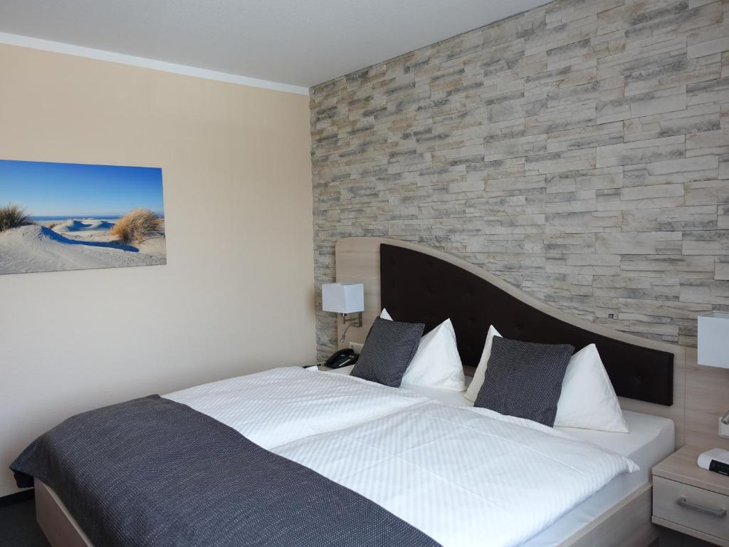 Postel nebo postele na pokoji v ubytování Hotel Prinz Heinrich