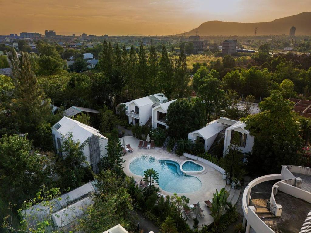 an aerial view of a house with a swimming pool at Montagne Residence in Kampot