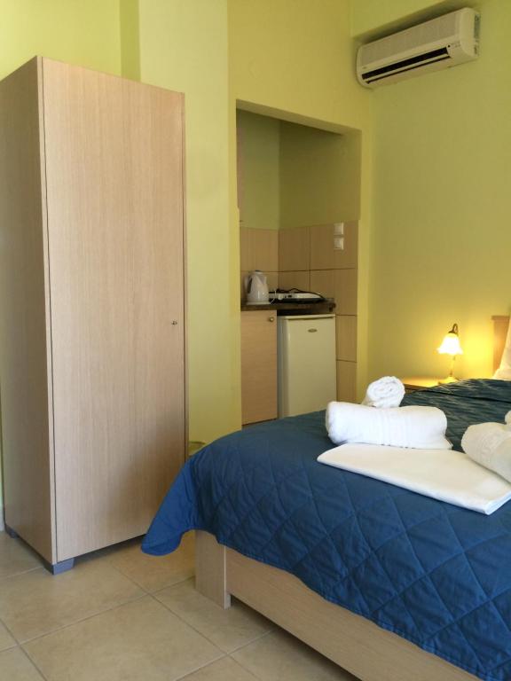 Posteľ alebo postele v izbe v ubytovaní Sarti Paradise