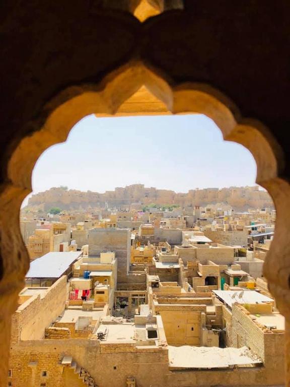 a view of a city from a window at Jimmy's Guest House &cafe in Jaisalmer