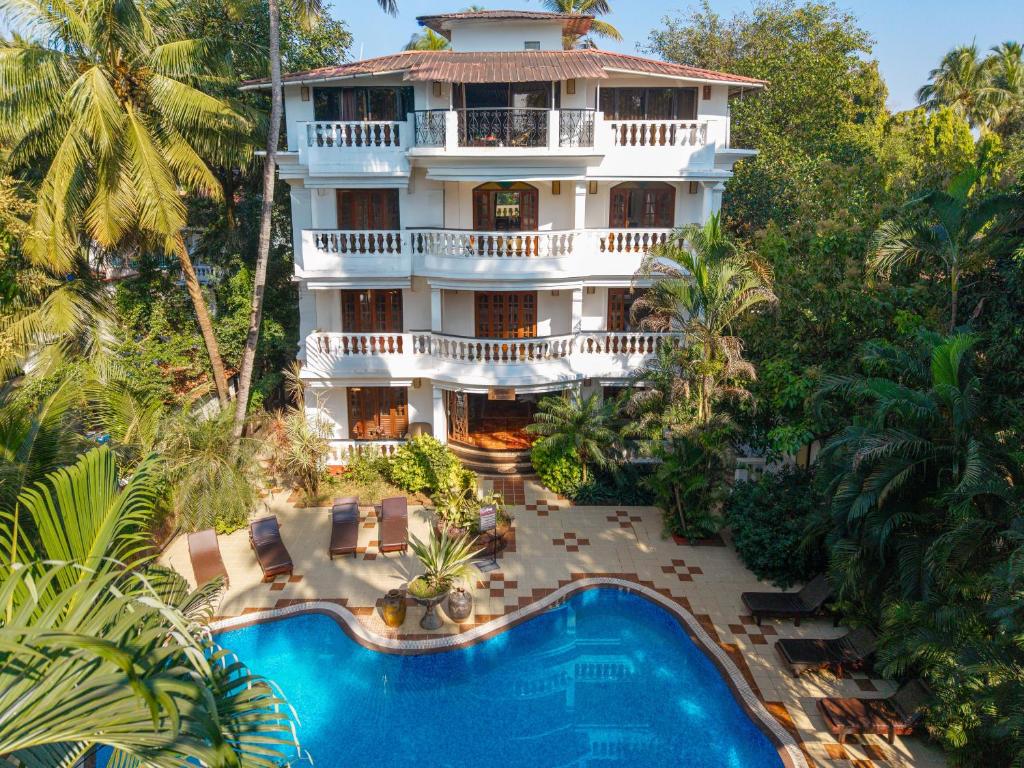 an aerial view of a resort with a swimming pool at Olive Hotel Alidia Beach Resort by Embassy Group in Baga