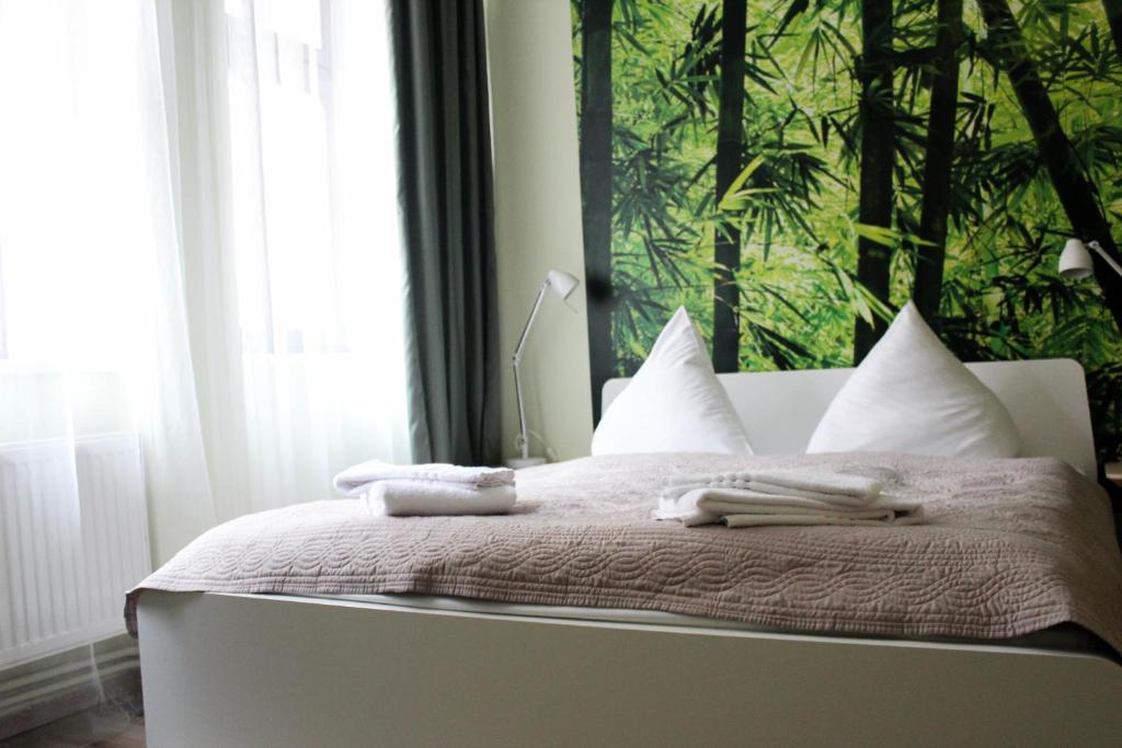 Łóżko lub łóżka w pokoju w obiekcie Ruterra Apartment Cimburkova