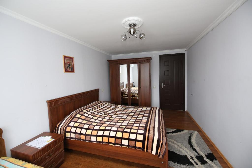 Postel nebo postele na pokoji v ubytování Guest House Green House