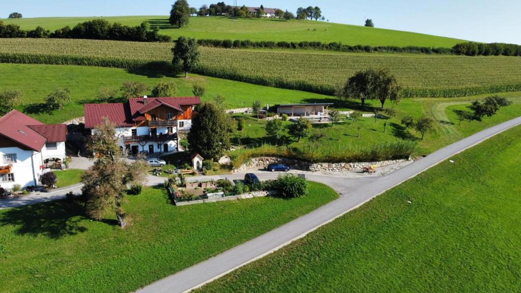 an aerial view of a house on a hill next to a road at Kornihof in Waidhofen an der Ybbs