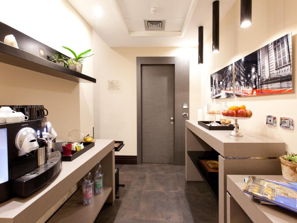 Kuchyňa alebo kuchynka v ubytovaní Quirinale Luxury Rooms