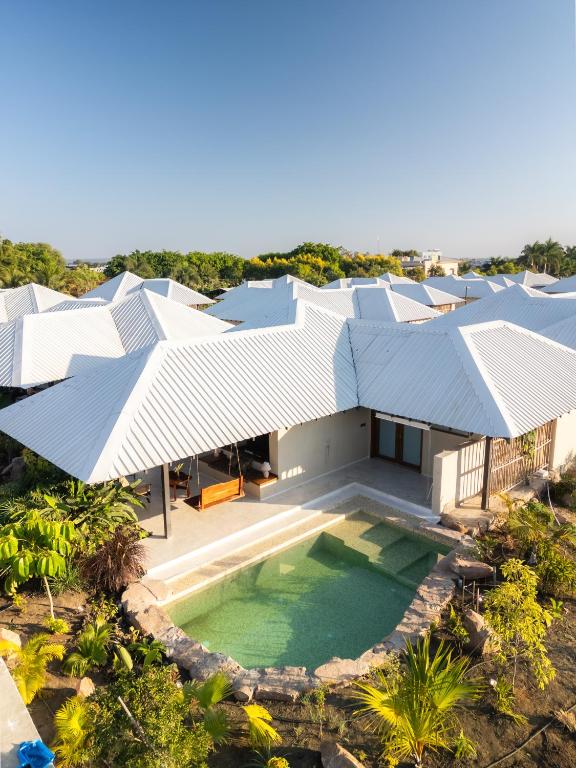 an aerial view of a house with a swimming pool at Shambhala in Bhopal