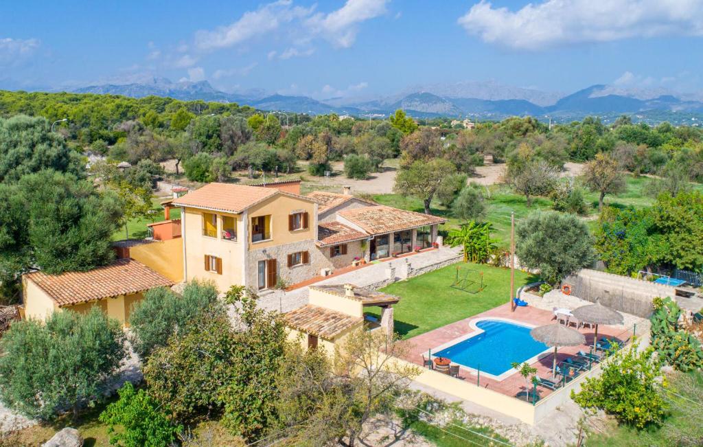 an aerial view of a house with a swimming pool at Ca Na Conceda in Alcudia