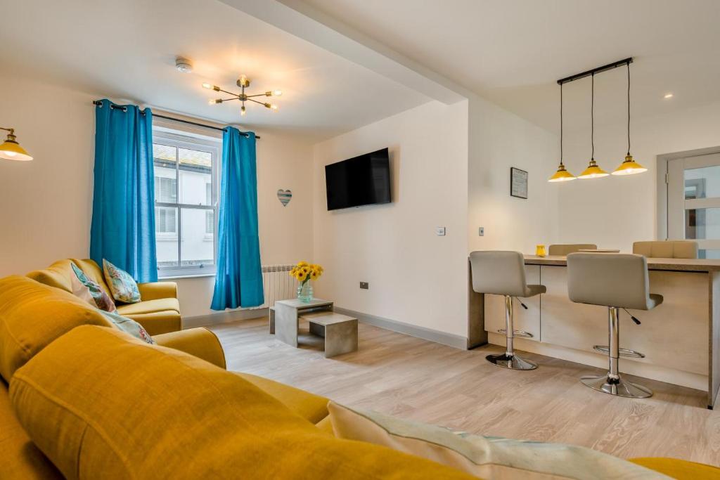 a living room with a couch and a table at 2 Bed in St. Ives oc-s28155 in St Ives
