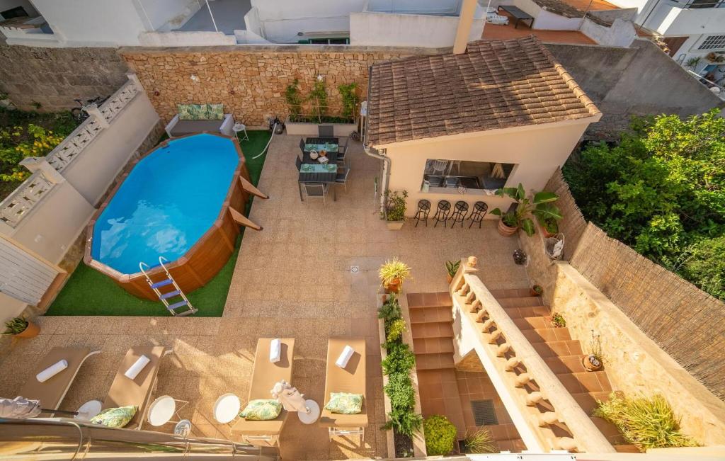 an aerial view of a house with a swimming pool at Casa Hermosa in Capdepera