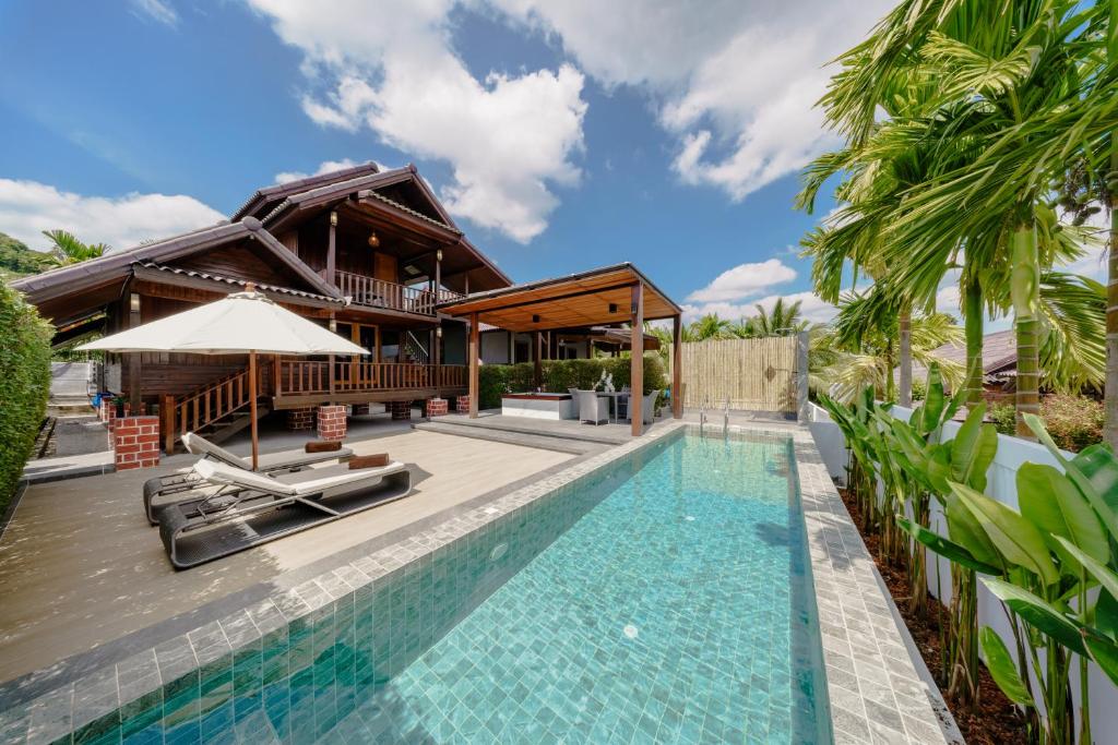 an image of a villa with a swimming pool at Calisto Valley I Luxury Pool Villa Krabi in Ao Nam Mao